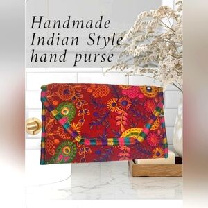 Handmaid Indian style hand purse.He also comes with the shoulder string